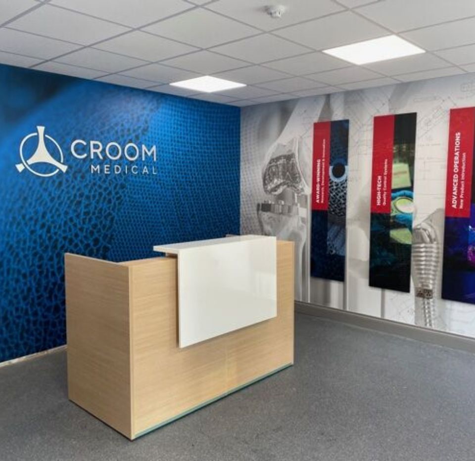 croom office with wall signage